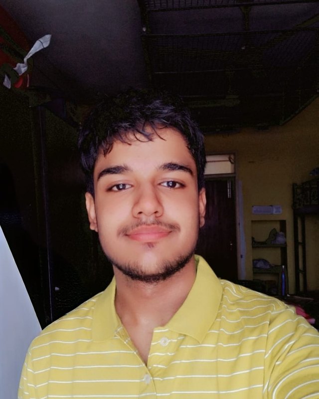 Divyam Madan, smiling